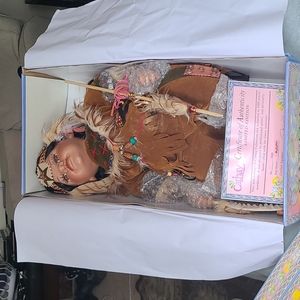 Cathay porcelain Native American Autumn doll. Included certificate  Authenticity